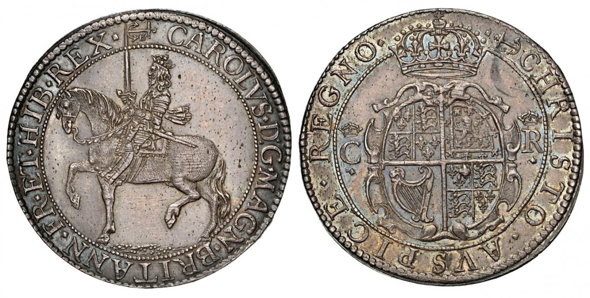 World Coins ("GREAT BRITAIN. England. Charles I. (King, 1625-1649). (1638-39)-Anchor and B AR Halfcrown. NGC MS63.  By Nicolas Briot. King on horseback, left / Arms with crowned C-R at sides. KM 197; SCBC-2858; North 2304.

Described in the Goldberg auction as follows)