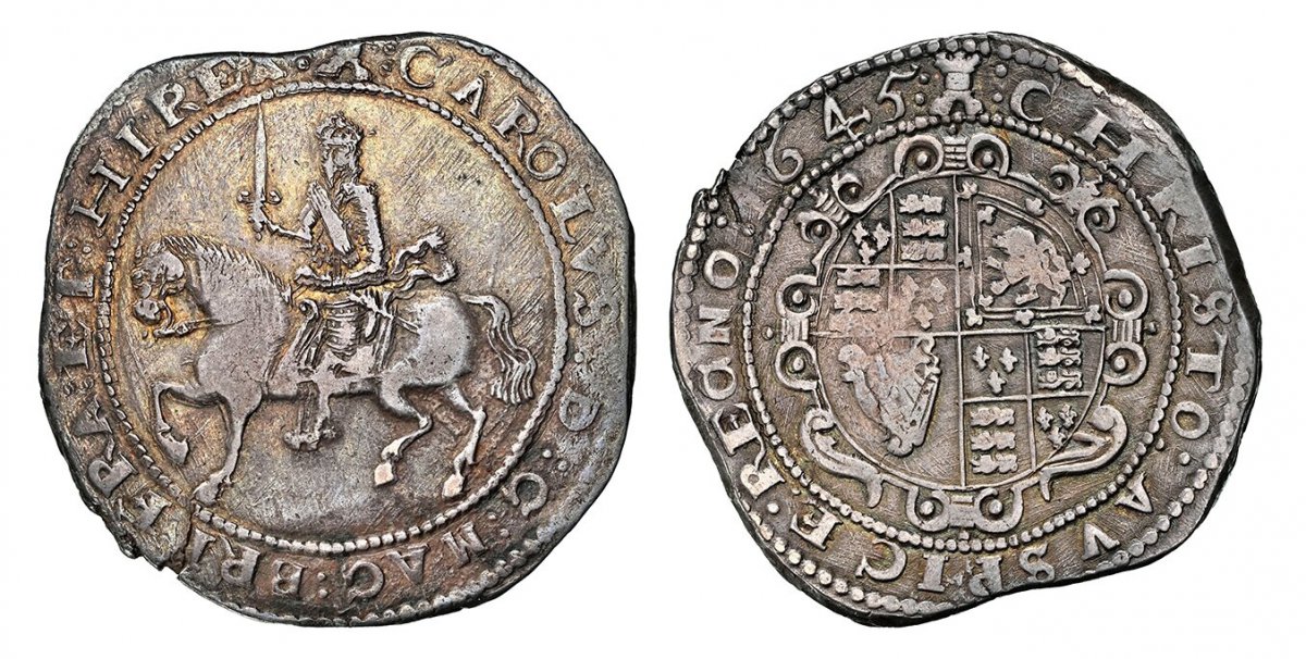 World Coins ("GREAT BRITAIN. England. Charles I. (King, 1625-1649). 1645-(Castle) AR Crown. NGC XF40.  Exeter. 29.74gm. Kings sash has loose ends instead of bow / Ornate oval shield of quartered arms. KM 334.4; SCBC-3062.

Please use this link to verify the NGC certi)