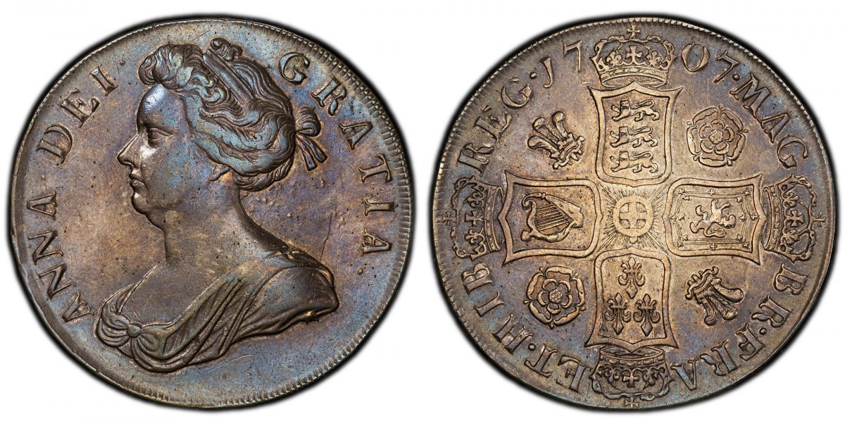 World Coins ("GREAT BRITAIN. Anne. (Queen, 1702-1714). 1707 AR Crown. PCGS AU50.  Edge: ANNO REGNI SEXTO. 29.74gm. ANNA · DEI · - GRATIA ·. Bust left / MAG - BR · FRA - ET · HIB - REG ·. Roses and plumes in alternating angles. KM 519.3; SCBC-3578; Dav.-1340.

Please u)